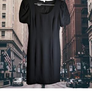 Donna Morgan 10 short sleeve w/embroidery accent, black polyester lined dress.